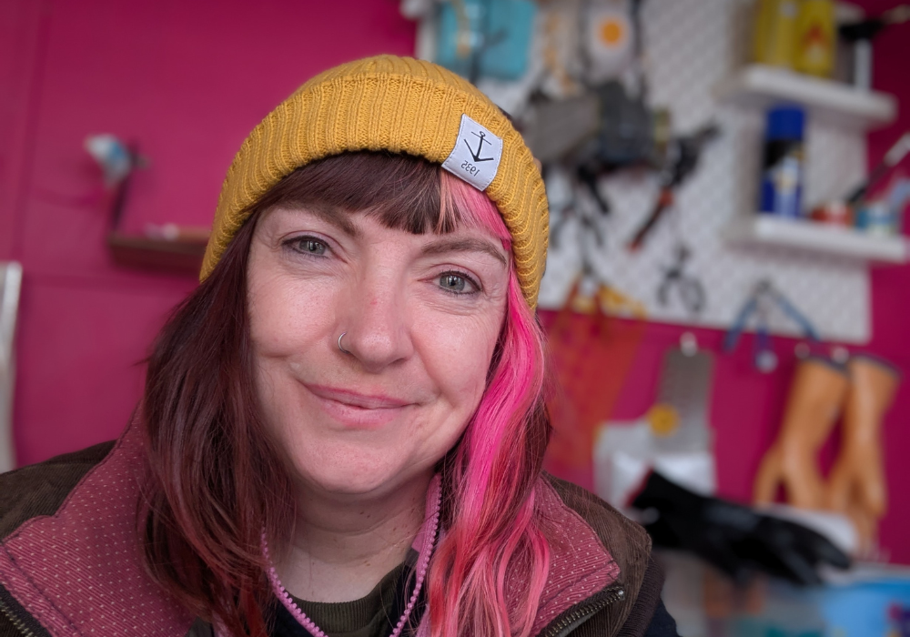 Louise Lea – Founder & Maker at Trash Panda Upcycled Jewellery in Southsea Louise Lea, founder of Trash Panda, creating handmade upcycled jewellery from reclaimed materials in the UK, in her studio in Southsea